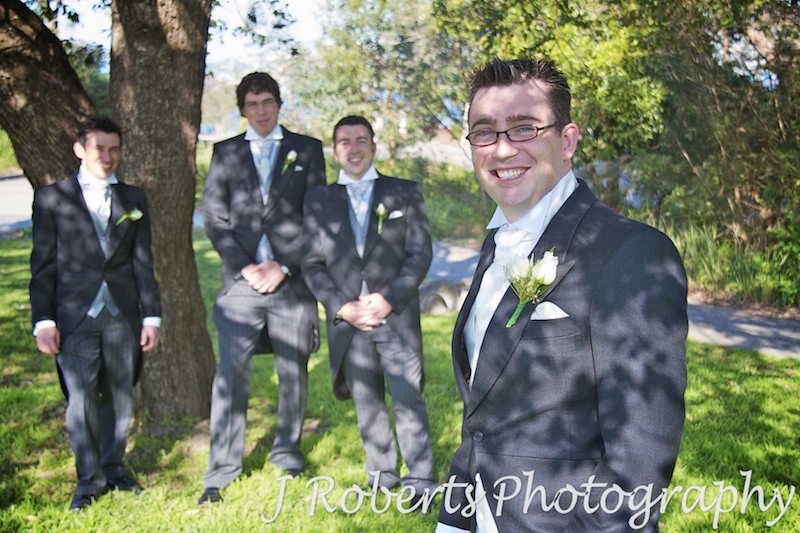 Groom and his grooms men laughing - wedding photography sydney